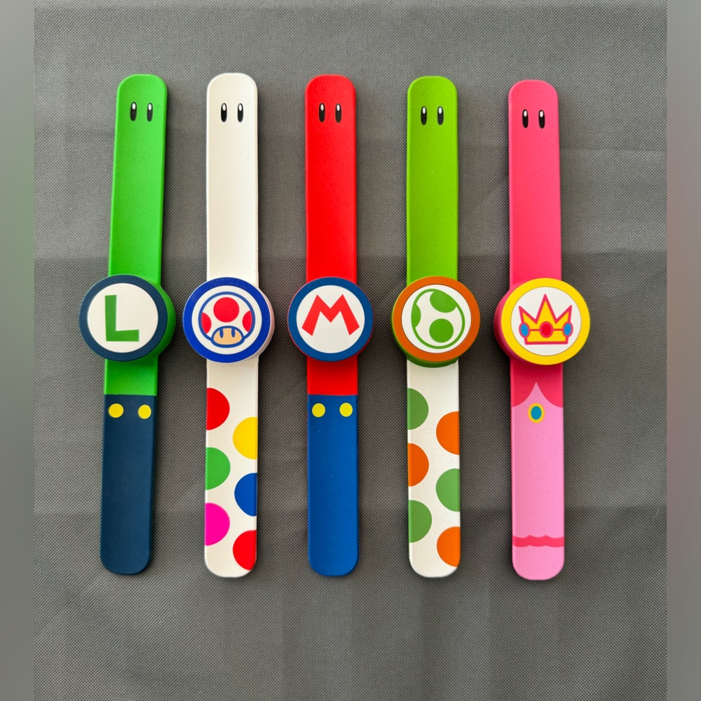 Mario World “Power Up Bands” for Universal Studios. Gently used, ONCE.